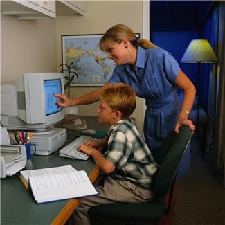 child teacher computer